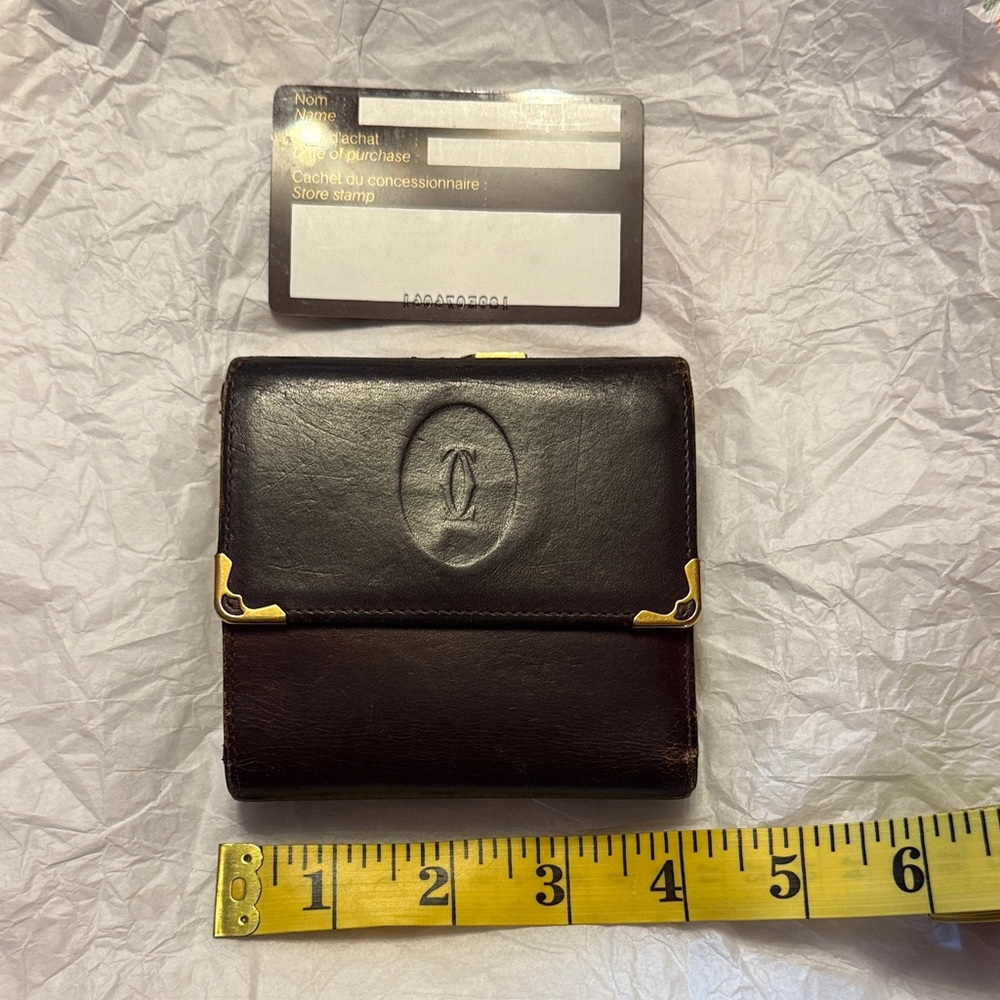 Pre-Loved Cartier Les Must Line burgundy Leather Wallet with KISS Lock Coin - Picture 15 of 16